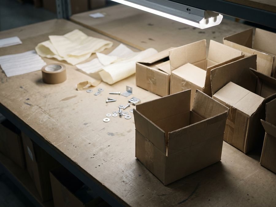 Packing bench, individual boxes and reference labels